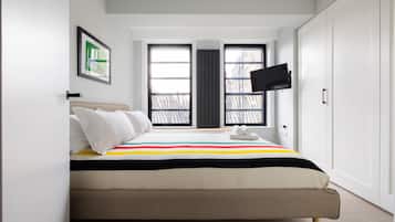 Luxe suite, 2 slaapkamers | 1 slaapkamer, luxe beddengoed, bedden met traagschuimmatras