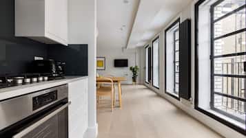 Luxury Suite, 2 Bedrooms | Private kitchen | Full-sized fridge, microwave, oven, stovetop