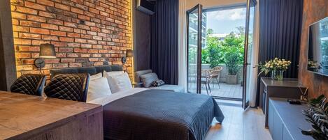 Leilighet – deluxe, terrasse (20) | Oppholdsområde | Flatskjerm-TV og oppvarmet gulv