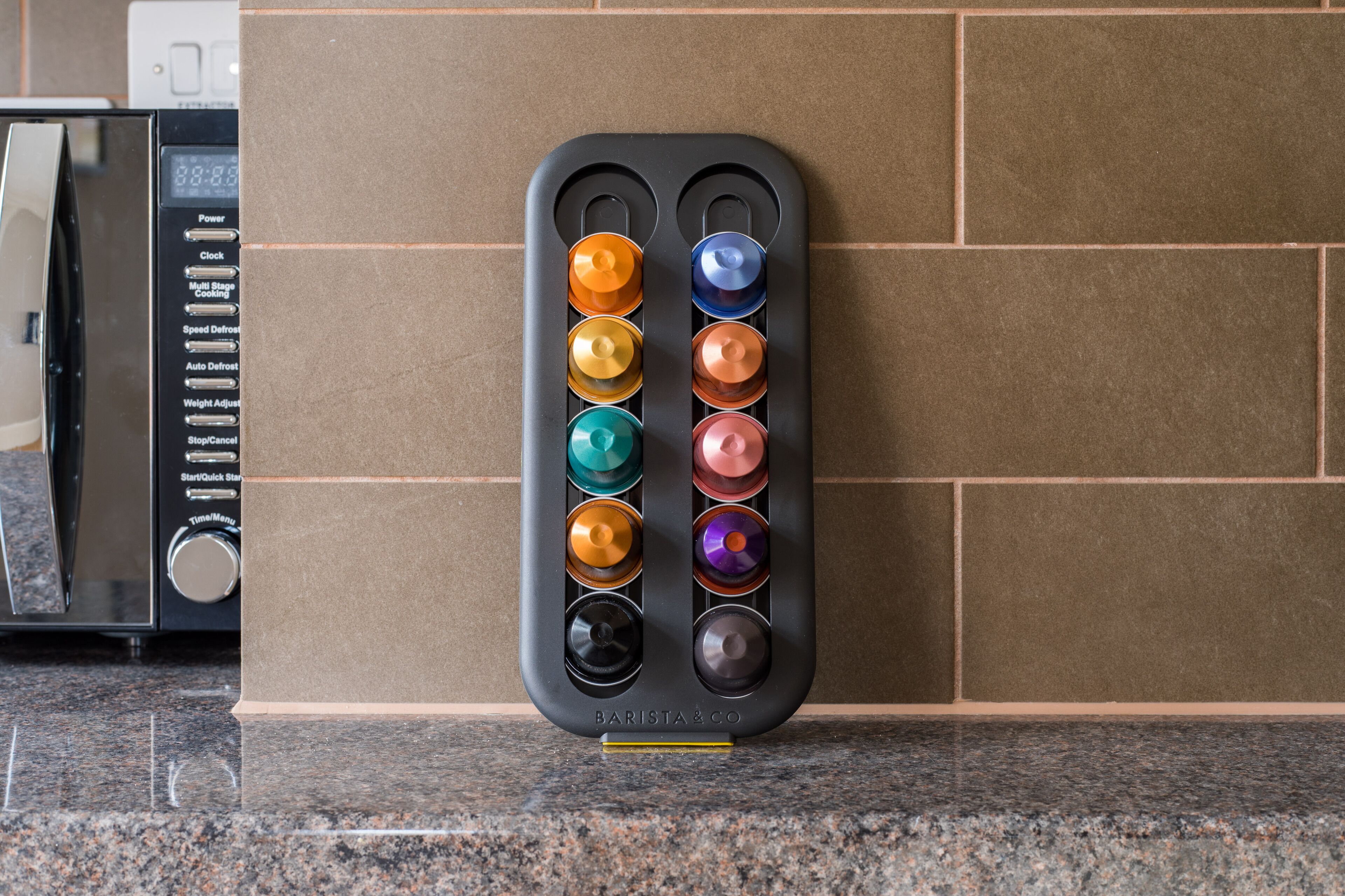 A coffee machine with multiple brewing settings on a kitchen counter.