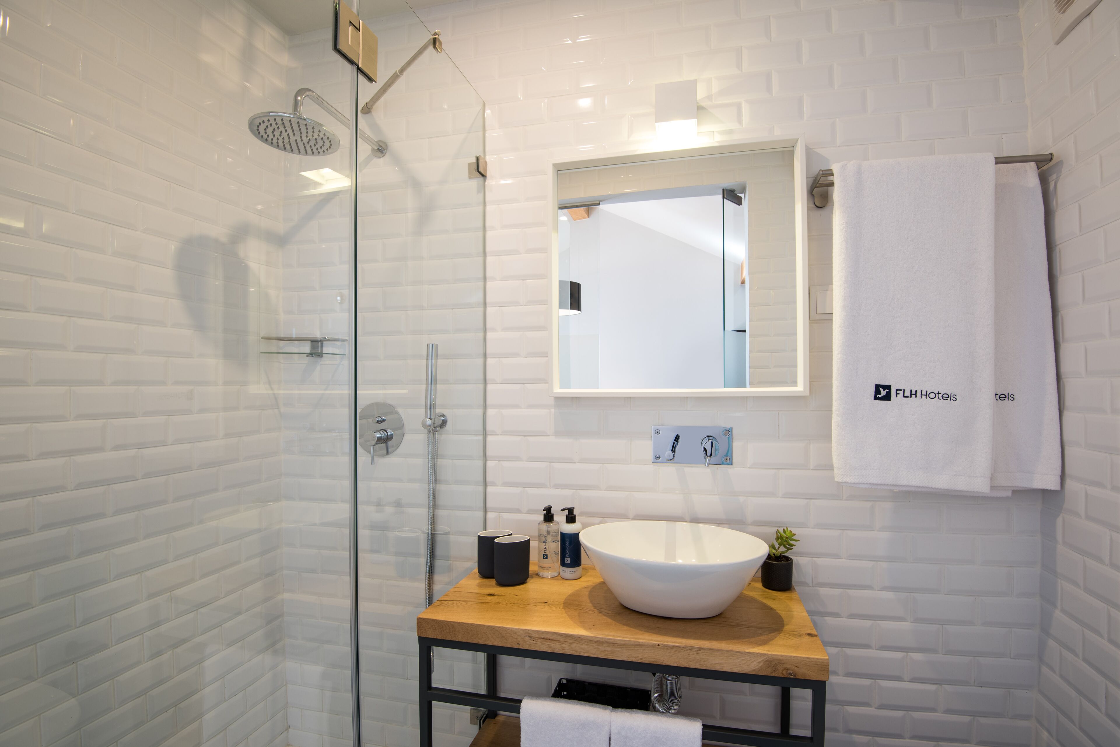 comfort room | bathroom | shower, hair dryer, towels, soap