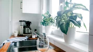 Fridge, microwave, stovetop, coffee/tea maker