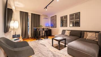 Suite | Sala de estar | Televisión de pantalla plana