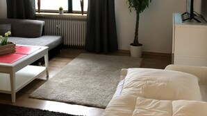 Departamento (incl.cleaning/sheets/towels fee 90EUR) | Área de sala de estar | Televisión de pantalla plana, Netflix, servicios de streaming y estéreo 