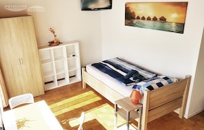 Memory-foam beds, iron/ironing board, free WiFi, bed sheets