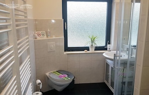 Hair dryer, towels, soap, toilet paper