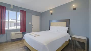 Habitación, 1 cama King size | Ropa de cama
