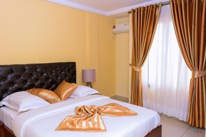 In-room safe, blackout curtains, iron/ironing board