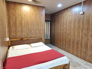 Deluxe Non AC Cottage | Free WiFi, bed sheets - IORA Cottages (Alibag)