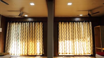 Super Suite Non AC Room | Free WiFi, bed sheets