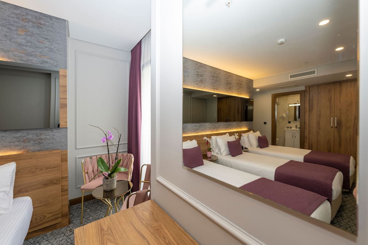 Premium bedding, down duvets, minibar, in-room safe