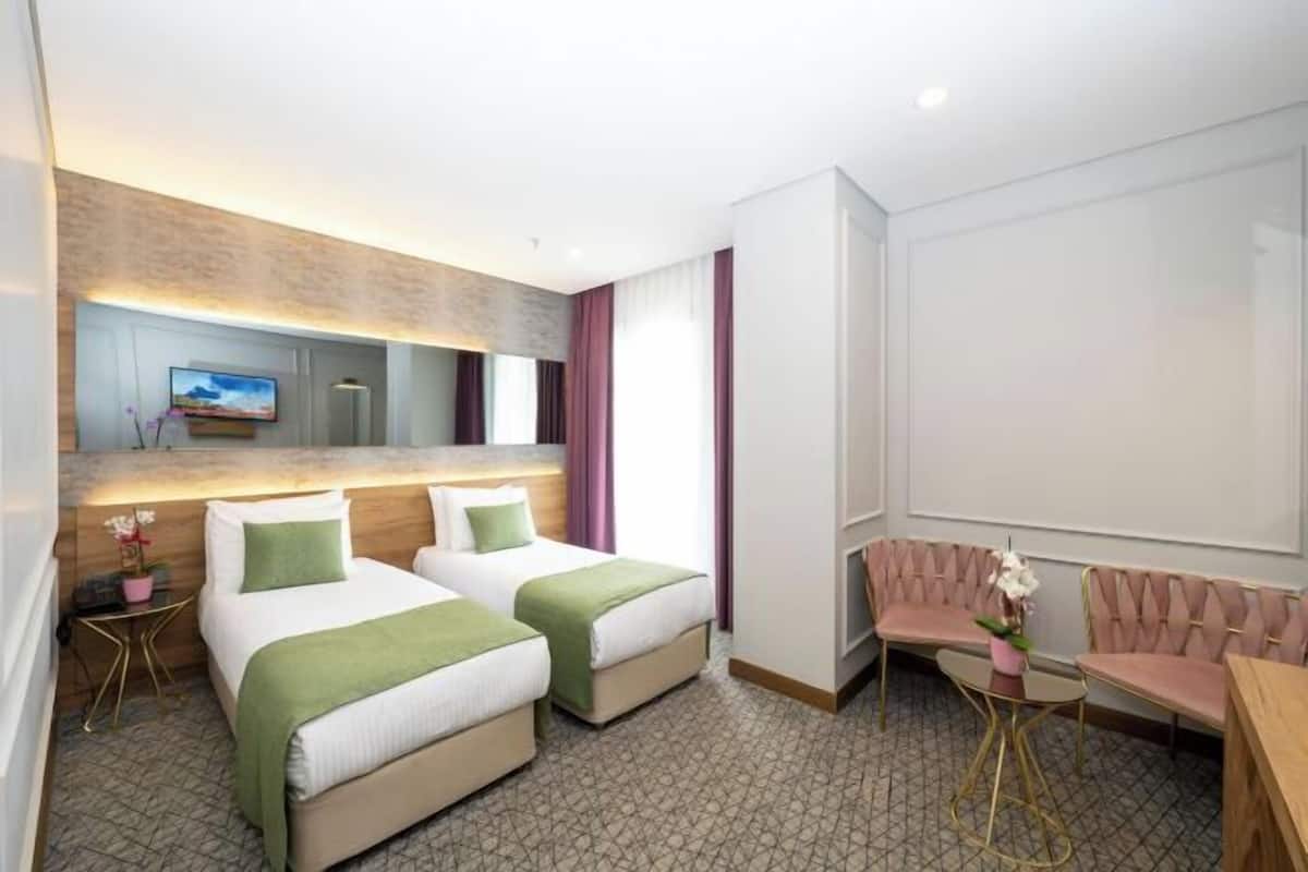 Premium bedding, down duvets, minibar, in-room safe