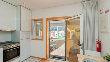 Exclusive House,1 Bedroom,Terrace, Pool Access | Private kitchen | Fridge, microwave, oven, stovetop