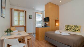 Studio, Balcony (1st Floor) | Hypo-allergenic bedding, down duvets, desk, iron/ironing board