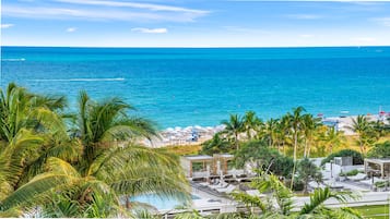 On the beach, sun loungers, beach towels