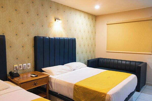 Habitación doble familiar, varias habitaciones | Cortinas blackout, insonorización, wifi gratis y ropa de cama 