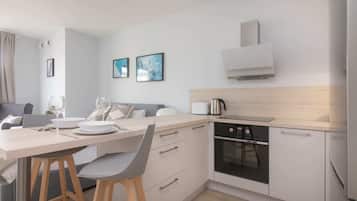Superior Studio | Private kitchen | Fridge, oven, stovetop, dishwasher