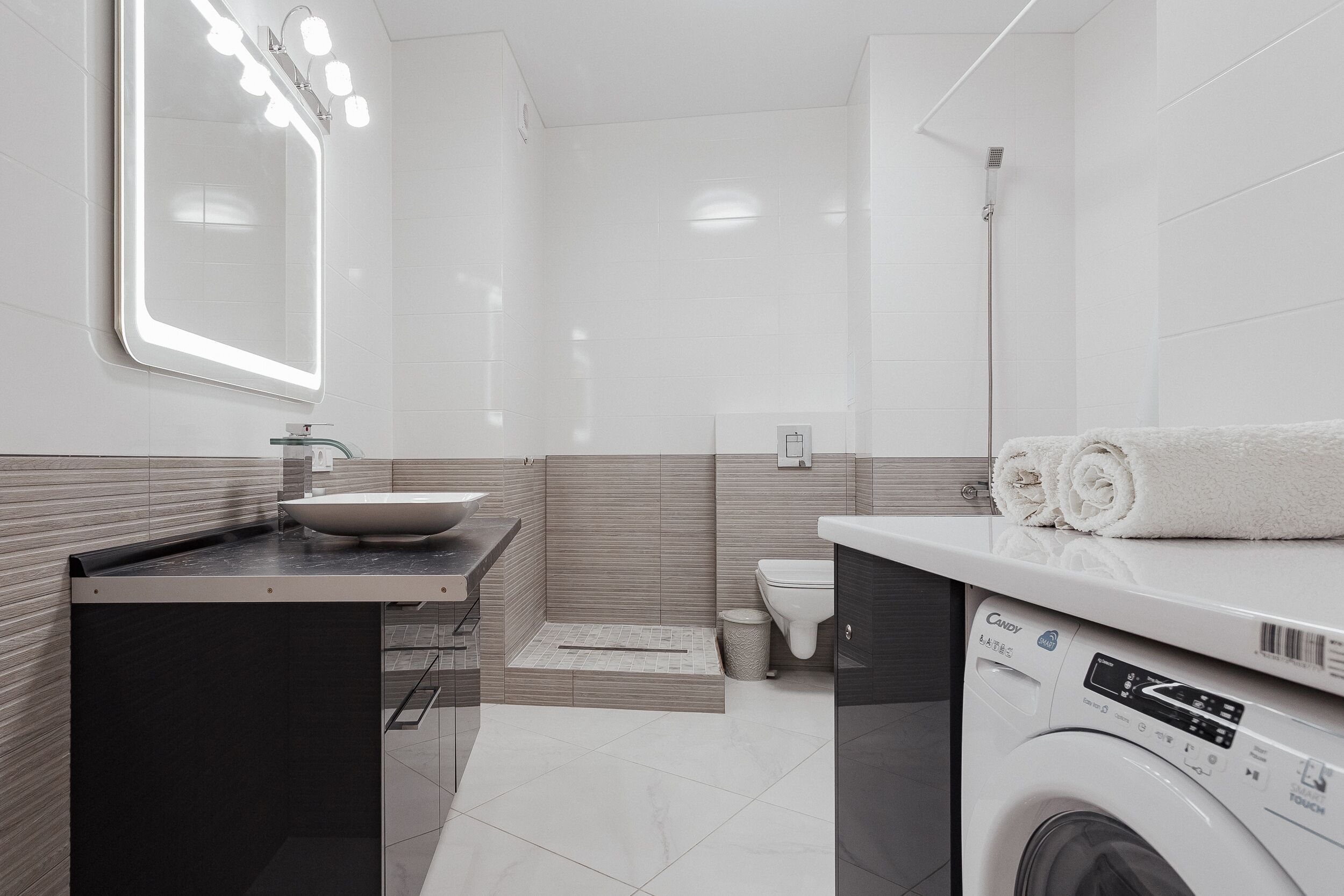 Bathtub, hair dryer, towels, soap