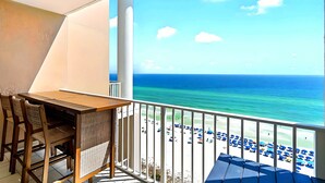 A balcony with a view of the beach and ocean. - Full Ocean Views, Steps to the Sand, Beach Chairs, Heated Pool/Hot Tub, Sleeps 8 (Miramar Beach)