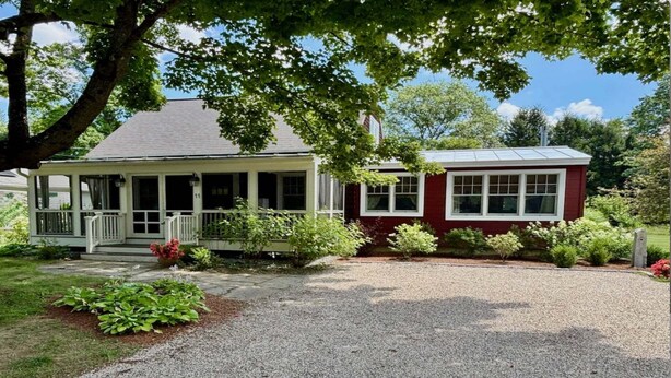 A two-story house with a porch and a covered porch area. - Screened Porch, Sun Deck, Spotless, GB Center! (Great Barrington)