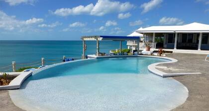 Cliff-Top Estate with Pool, Sunsets, Direct Caribbean Access, Walk to Rest./Bar!