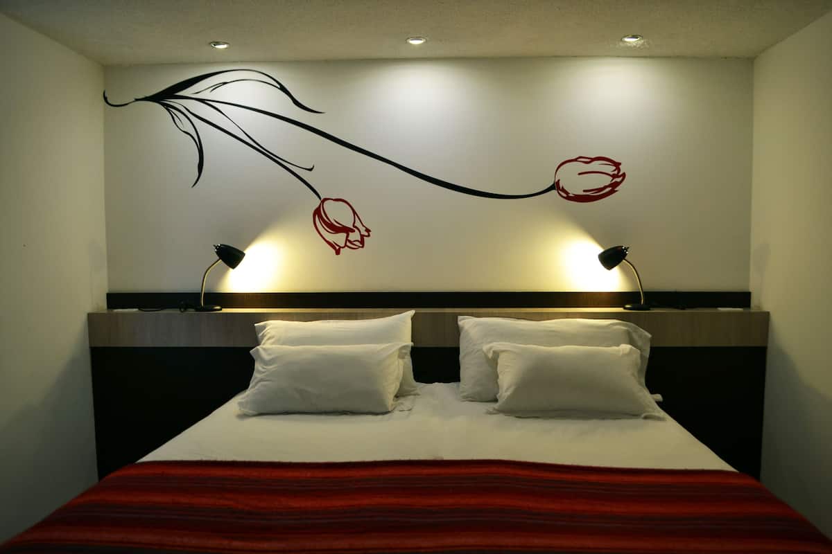 Down duvets, Select Comfort beds, individually furnished, desk