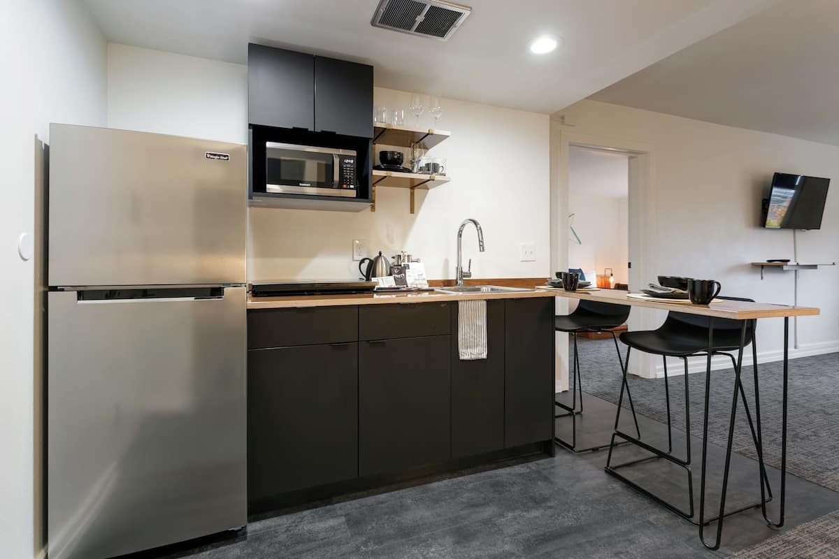 43-inch flat-screen tv with cable channels, tv, books