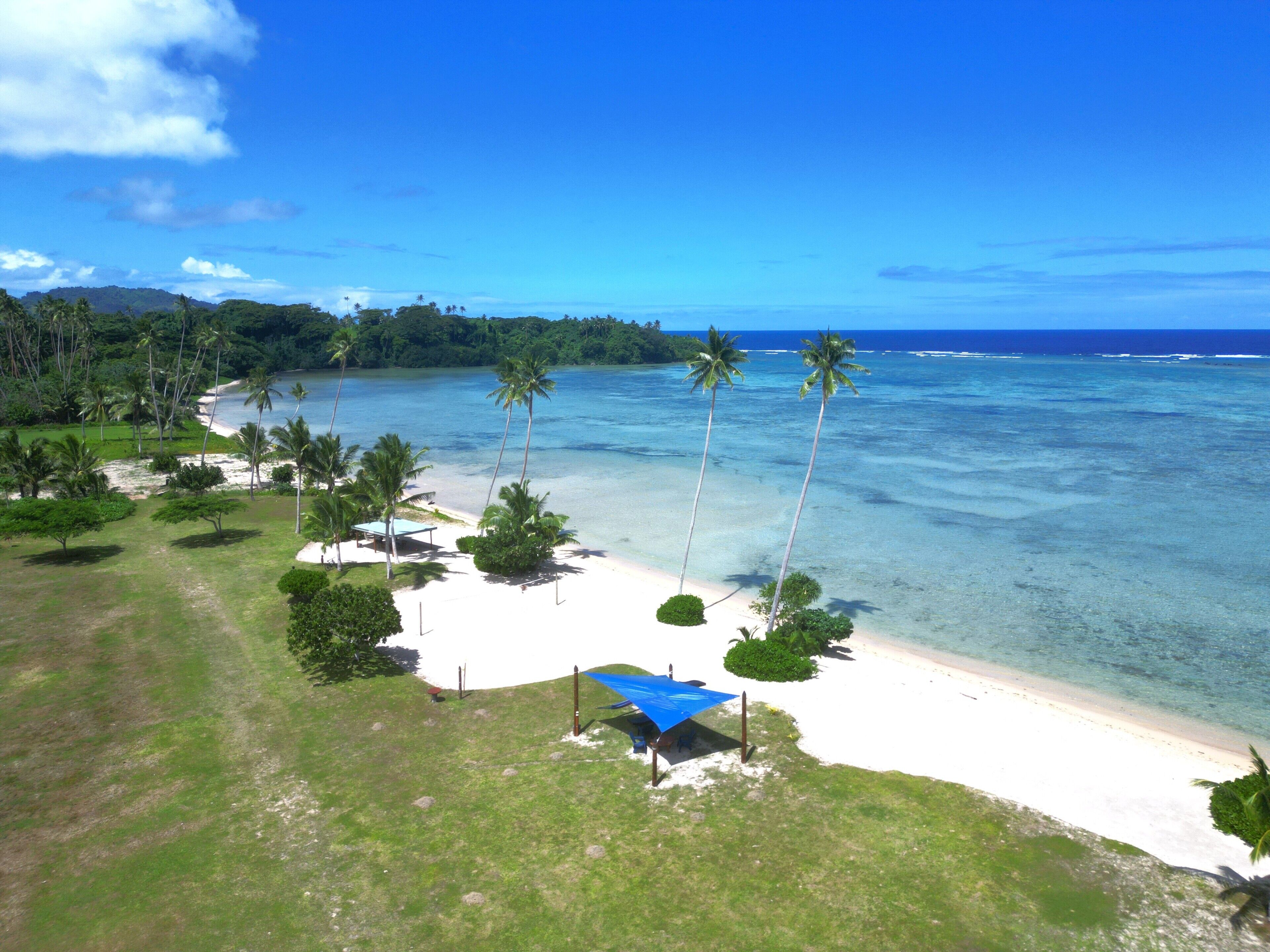 On the beach, sun loungers, beach towels