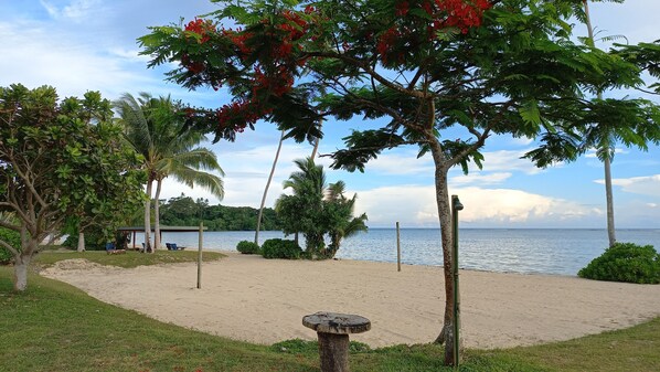 On the beach, sun-loungers, beach towels