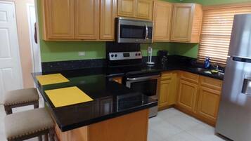 Superior Villa | Private kitchen | Fridge, microwave, oven, cookware/dishes/utensils