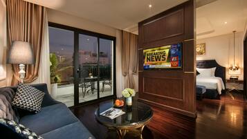 Anatole Terrace Suite | Living area | 55-inch Smart TV with cable channels, TV