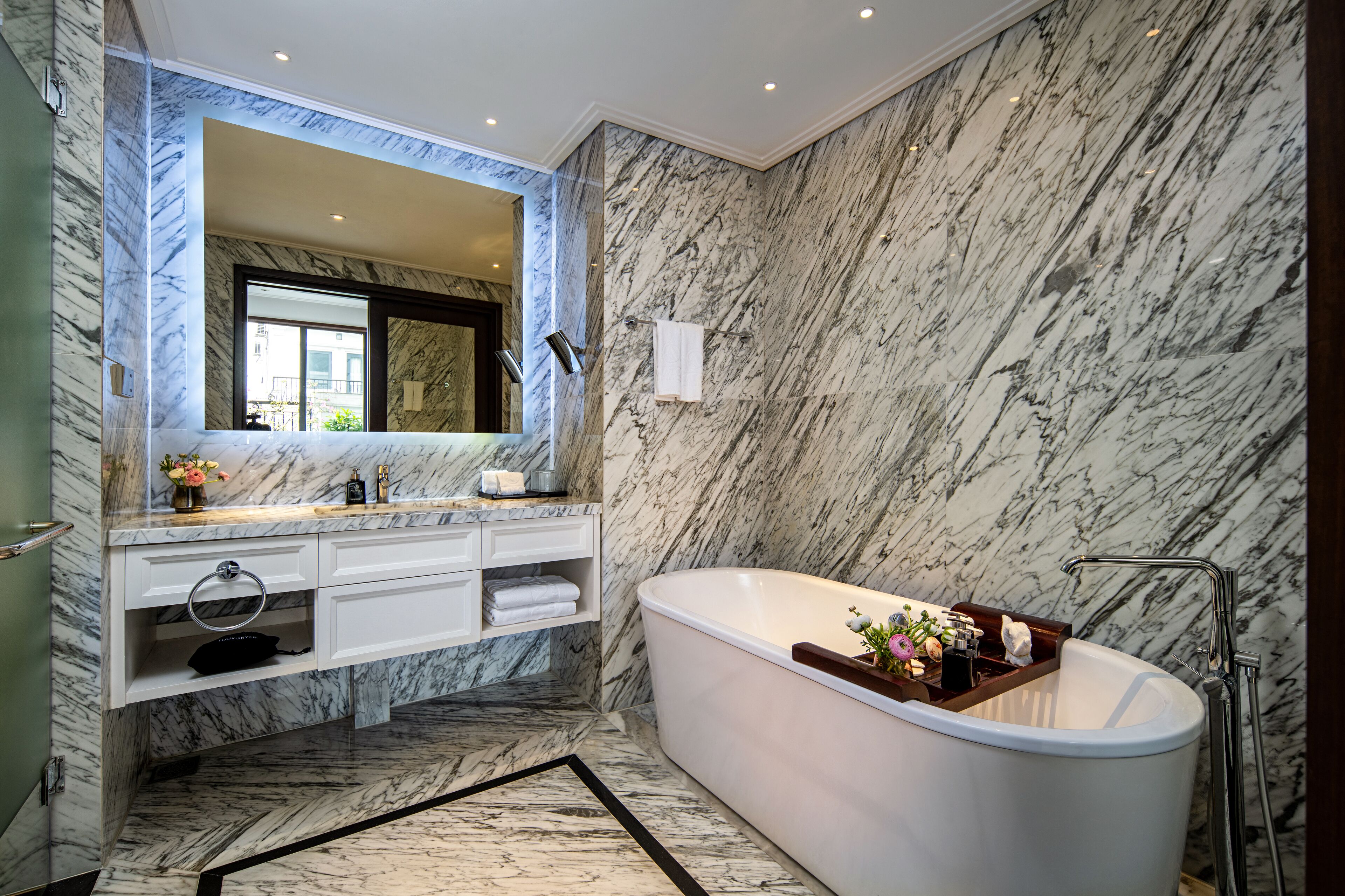 anatole terrace suite | bathroom | eco-friendly toiletries, hair dryer, bathrobes, slippers
