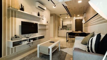 Apartemen Elite, 3 kamar tidur | Area keluarga | Smart TV 50-inci dengan saluran TV digital