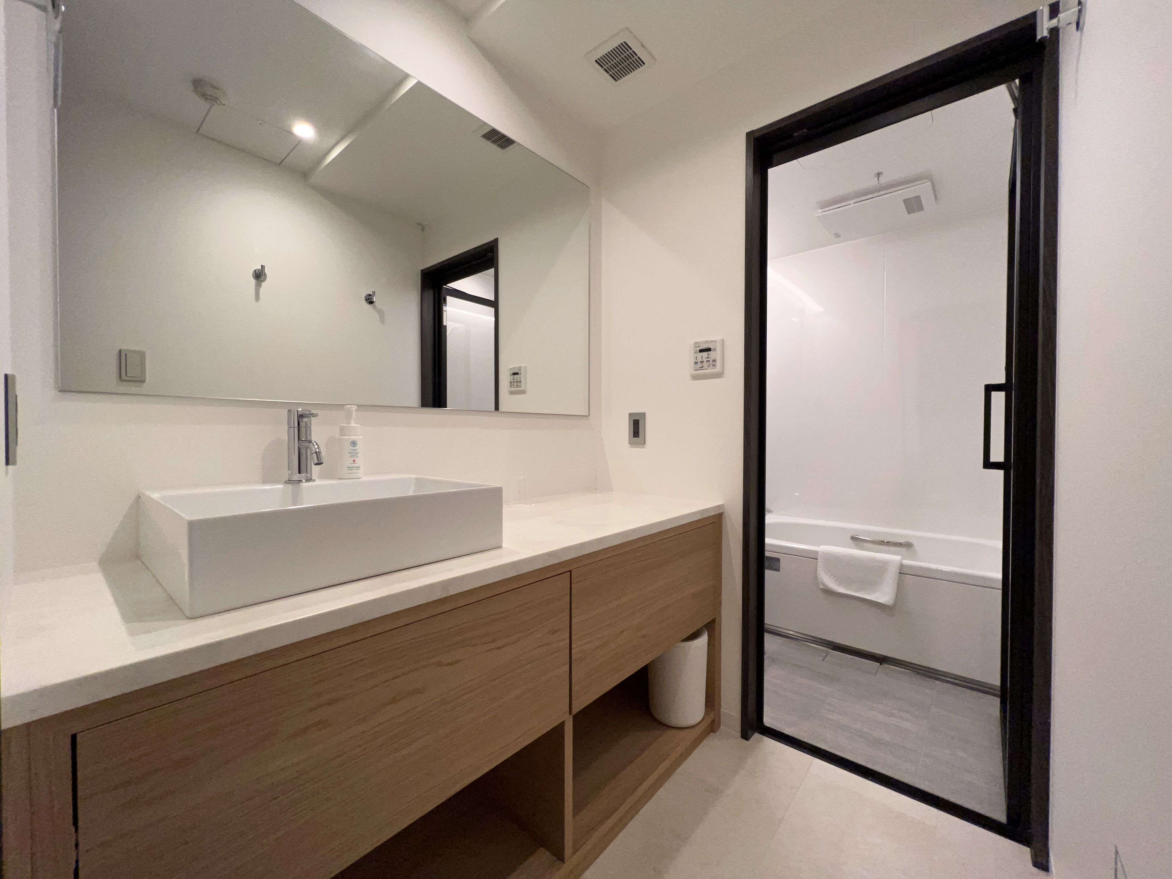 separate bathtub and shower, deep-soaking bathtub, free toiletries