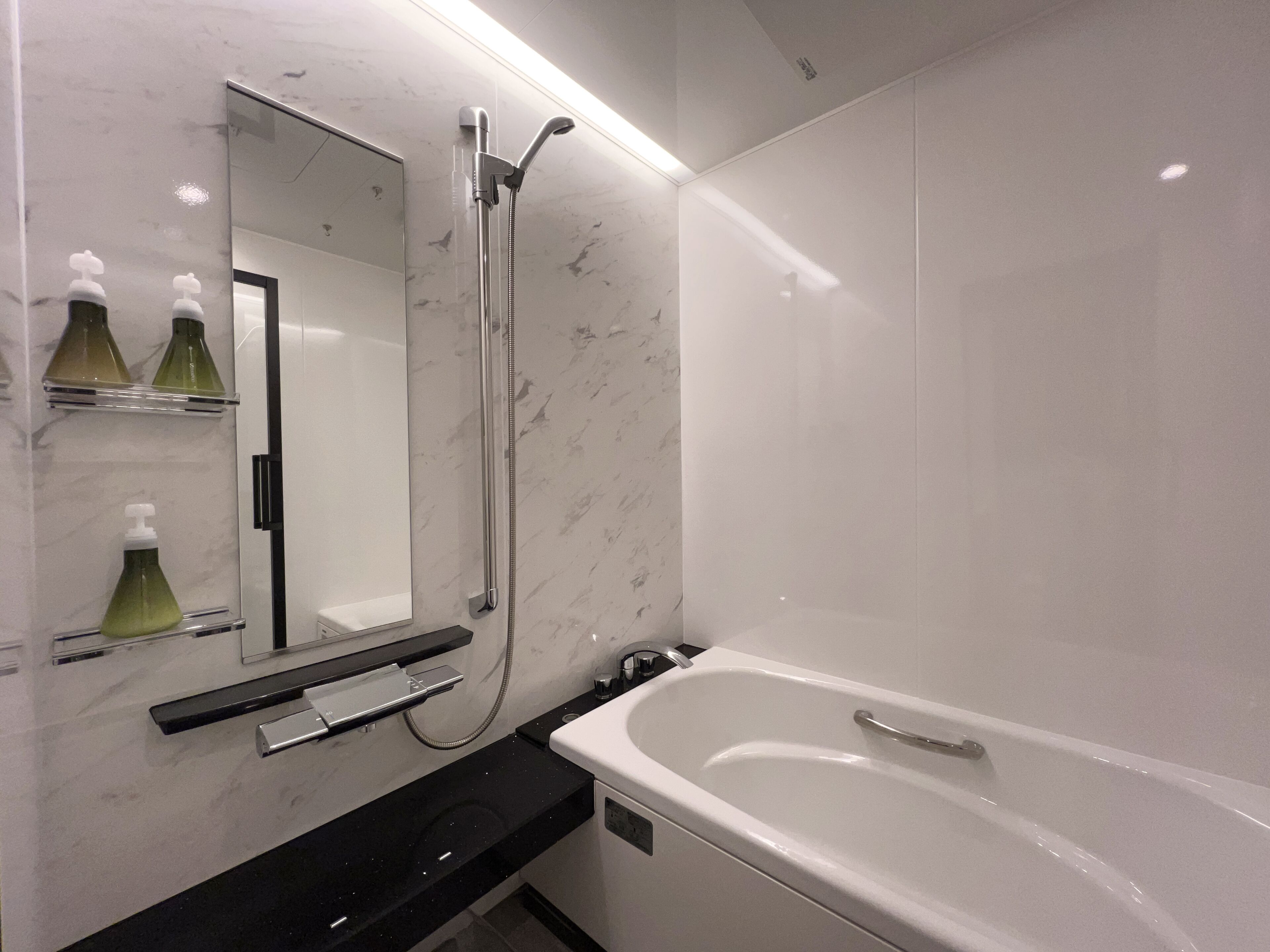 separate bathtub and shower, deep-soaking bathtub, free toiletries