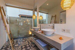 Shower, hair dryer, towels, soap
