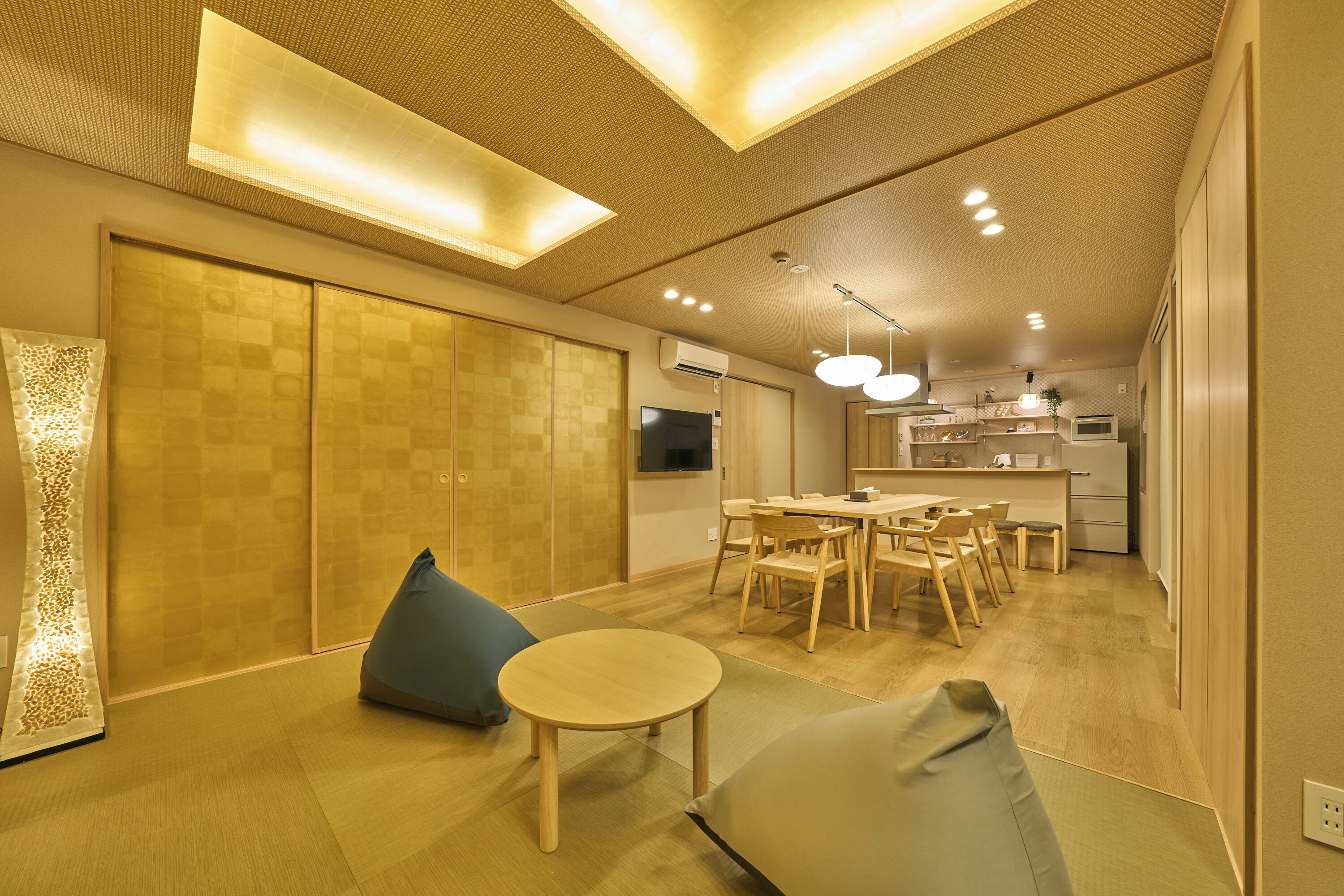 Family Suite | Living area | Flat-screen TV, first-run films