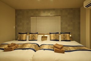 Condo familiar, 3 habitaciones (Family Suite) | 3 habitaciones, escritorio y espacio para trabajar con laptop
