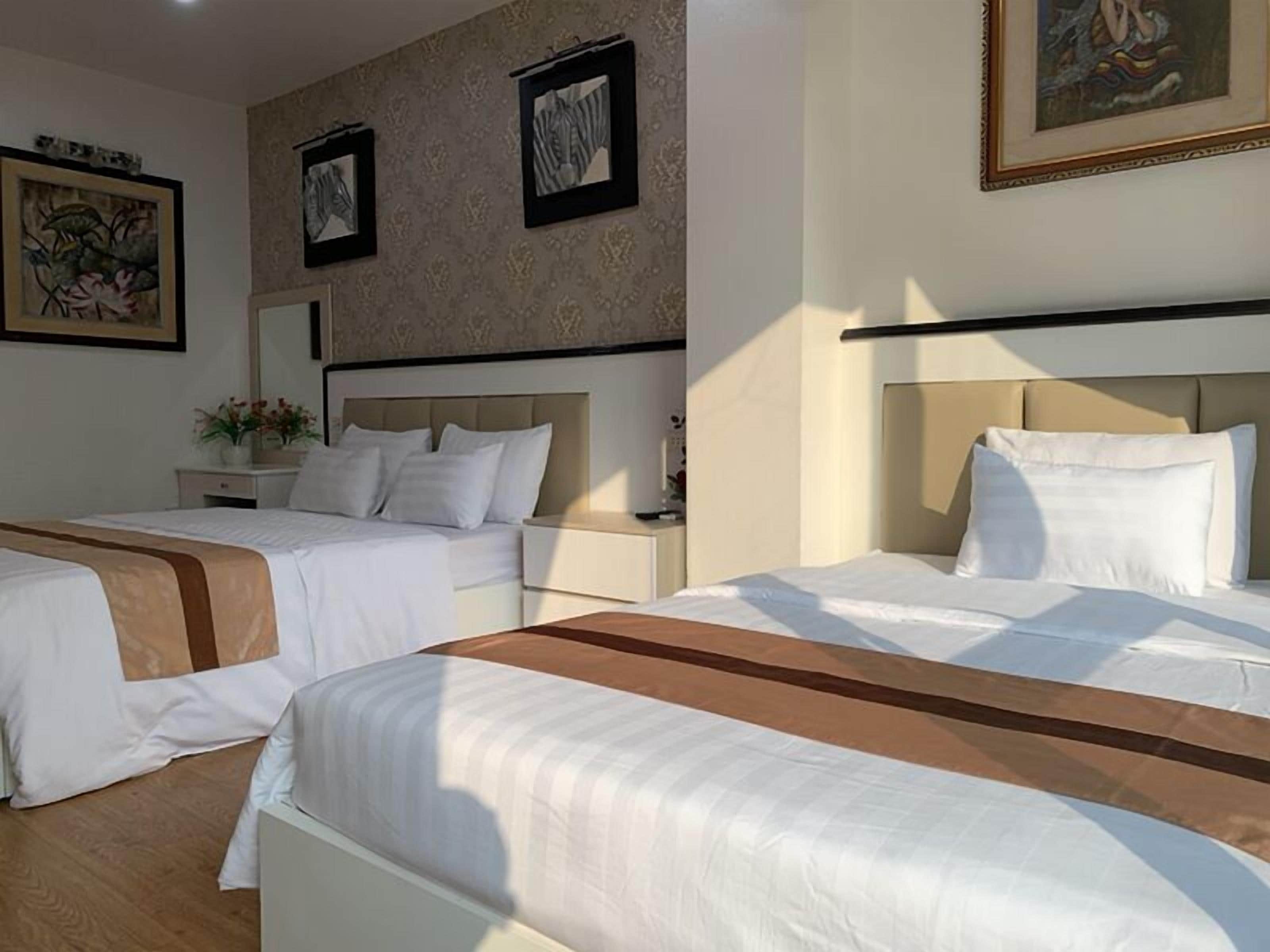 ห้องแฟมิลี่ | มินิบาร์, โต๊ะทำงาน, ผ้าม่านกันแสง, Wi-Fi ฟรี