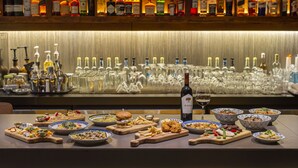 A bar area with various bottles and glasses. - glue Hotel (Seoul)