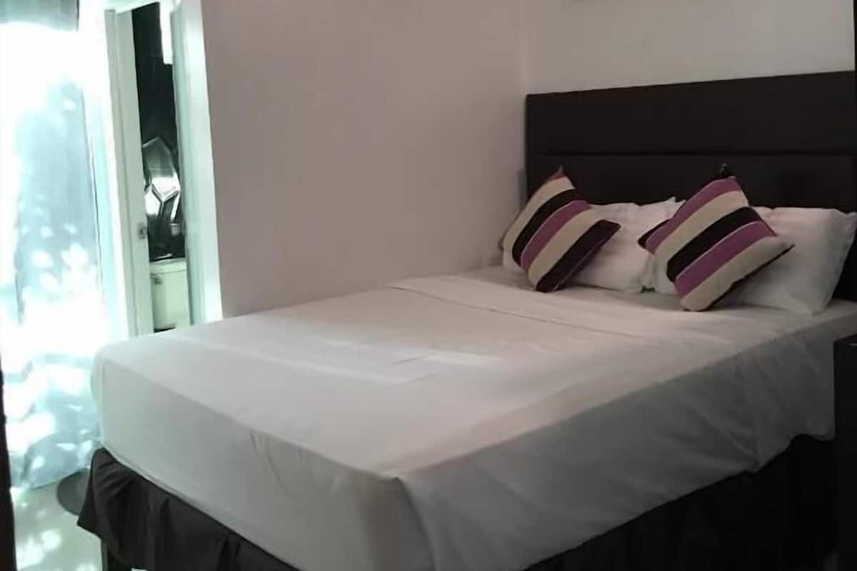 Chambre Deluxe | 1 chambre, accĂšs au Wi-Fi (inclus), literie fournie