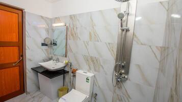 Shower, rainfall showerhead, towels