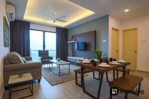 Design Apartment, 2 Bedrooms | Living room | 40-inch Smart TV with digital channels, Netflix, ping pong - Atlantis Executive Melaka by I Housing (Malacca City)