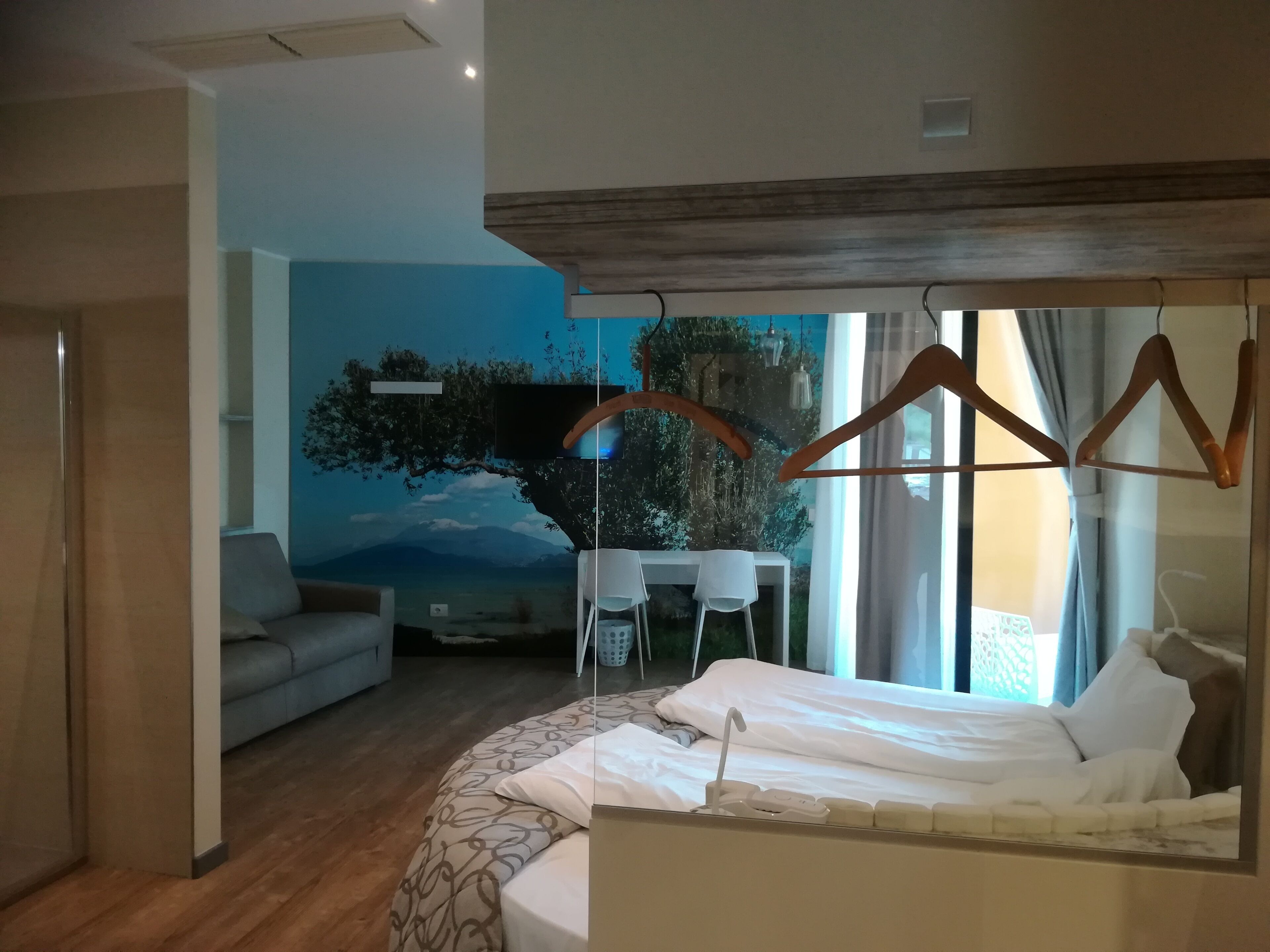 junior suite, balcony | 1 bedroom, in-room safe, individually furnished, desk