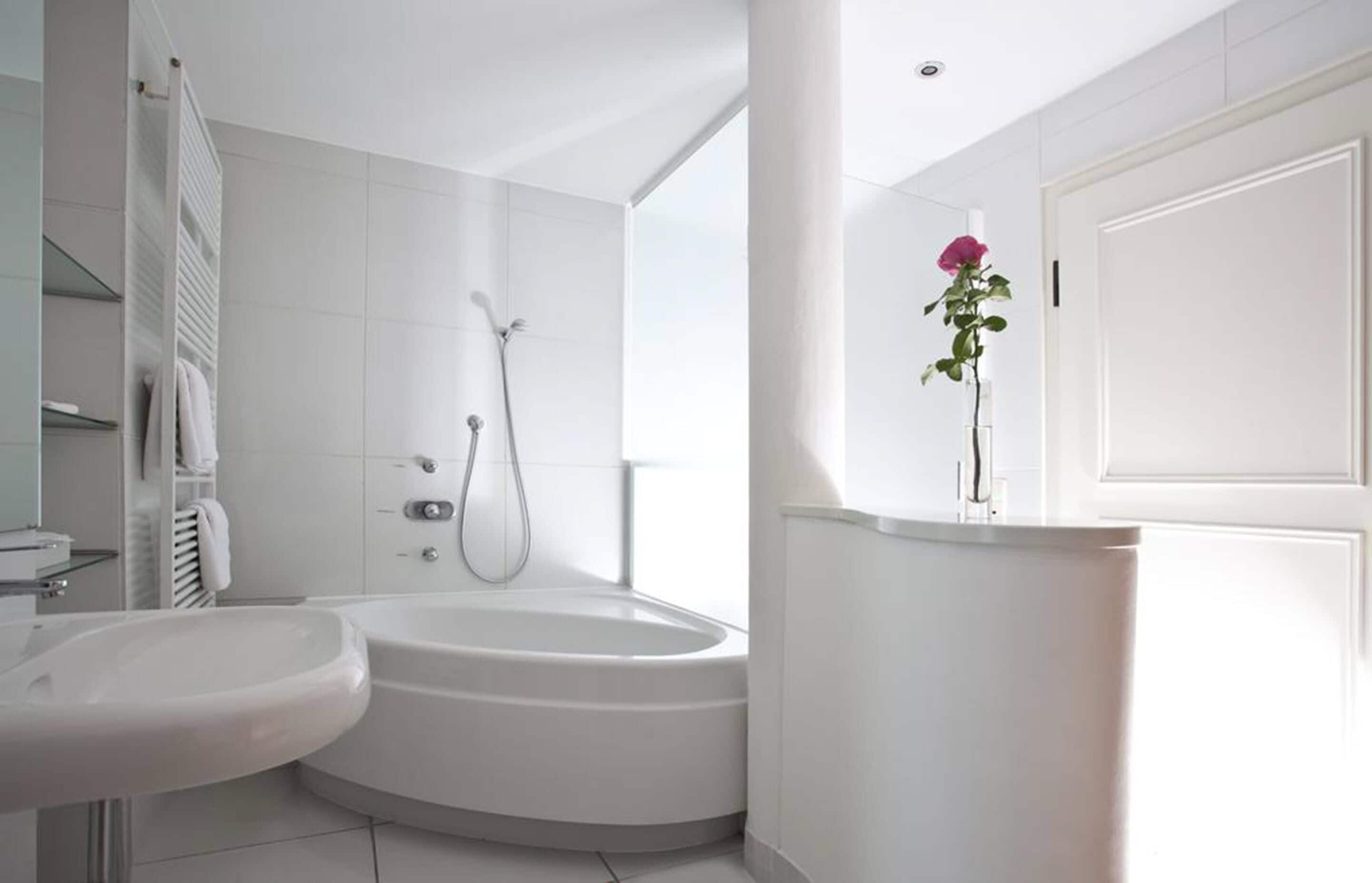 studio | bathroom | hair dryer, towels, soap, shampoo