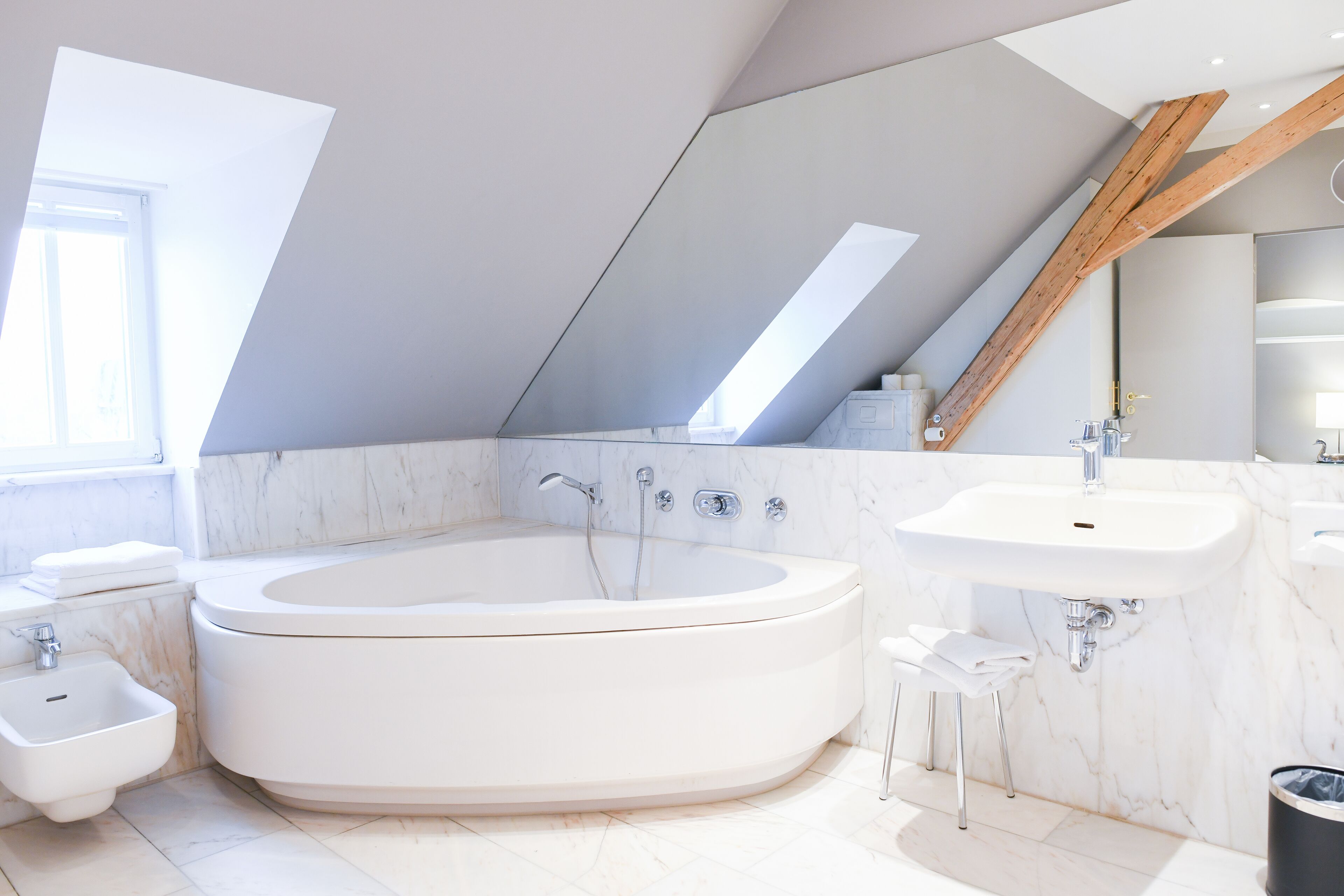 the suite | bathroom | hair dryer, towels, soap, shampoo