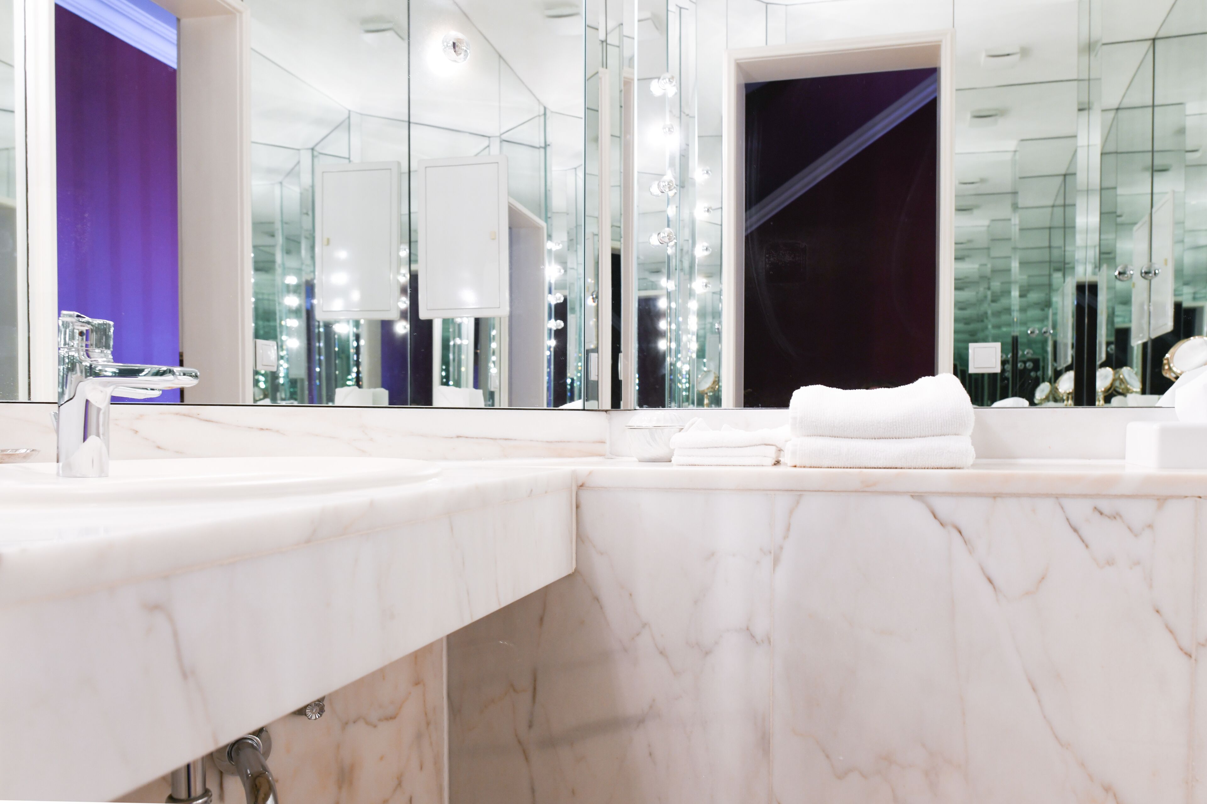 the suite | bathroom | hair dryer, towels, soap, shampoo