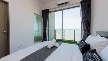 Premium bedding, blackout curtains, iron/ironing board, bed sheets