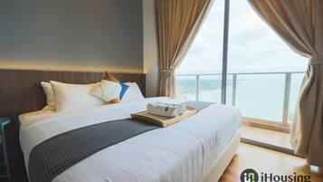 Premium bedding, blackout curtains, iron/ironing board, bed sheets