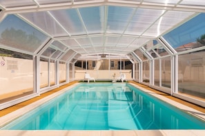 Indoor pool, seasonal outdoor pool, pool umbrellas, sun loungers